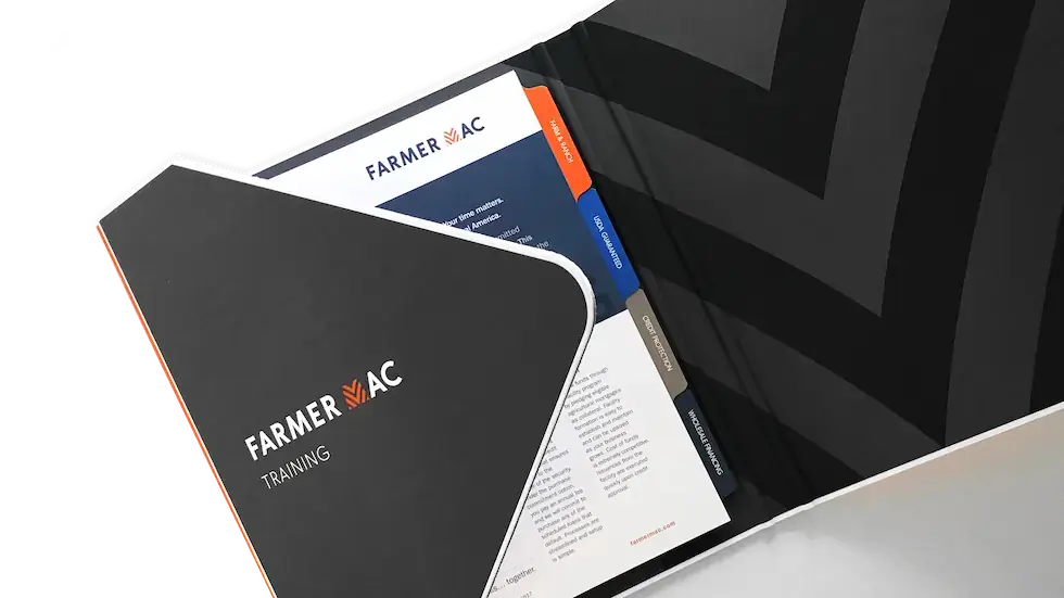 a branded Farmer Mac binder